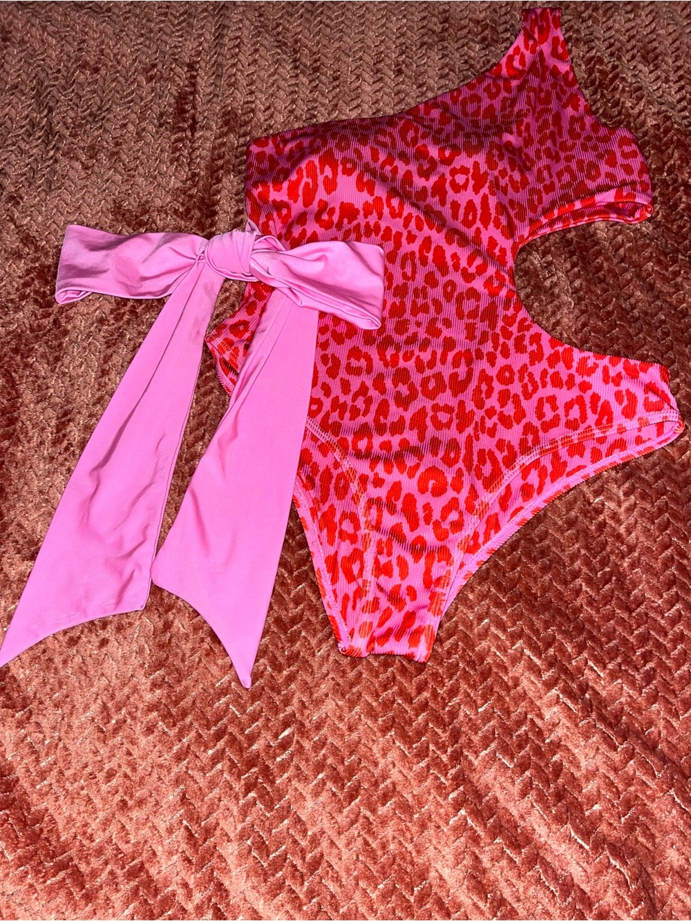 Pink Lily Leopard One-Shoulder swim One-Piece with flowing bow tie. Size L